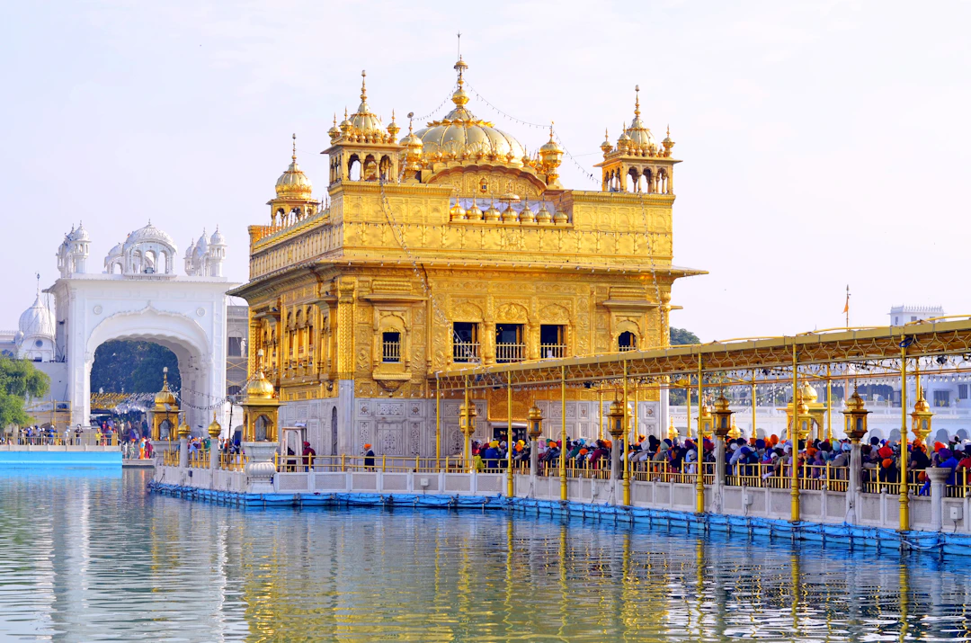 Sri Harmandir Sahib beside the sarovar and covered causeway in Amritsar